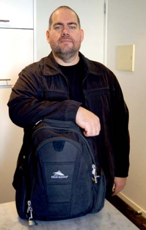 Big man, small bag ... travel writer Tim Richards with his trusty, cabin-size backpack.