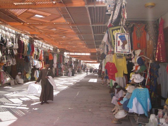 An Egyptian vendor advancing with his wares!