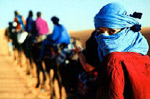 Photo of me (blue veil) on the camel trek