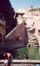 The main Monkey Temple includes a bathing area where both humans and monkeys bathe