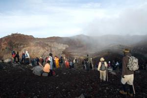 Crowds line the edge of the crater