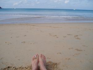 Relaxing tired feet at Nai Harn Beach