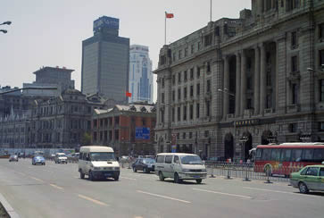 A view of some of the grand old buildings on the Bund. Note the modern towers in the background.