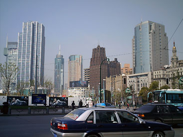 Renmin (People's) Square. The dark-red brick building in the center is the Park Hotel.