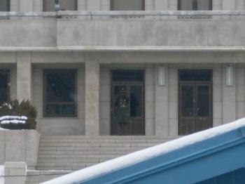 North Korean soldier peeking at us through binoculaurs