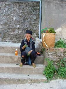 Village woman on the steps