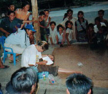 Marika entertains the entire village with some sketching