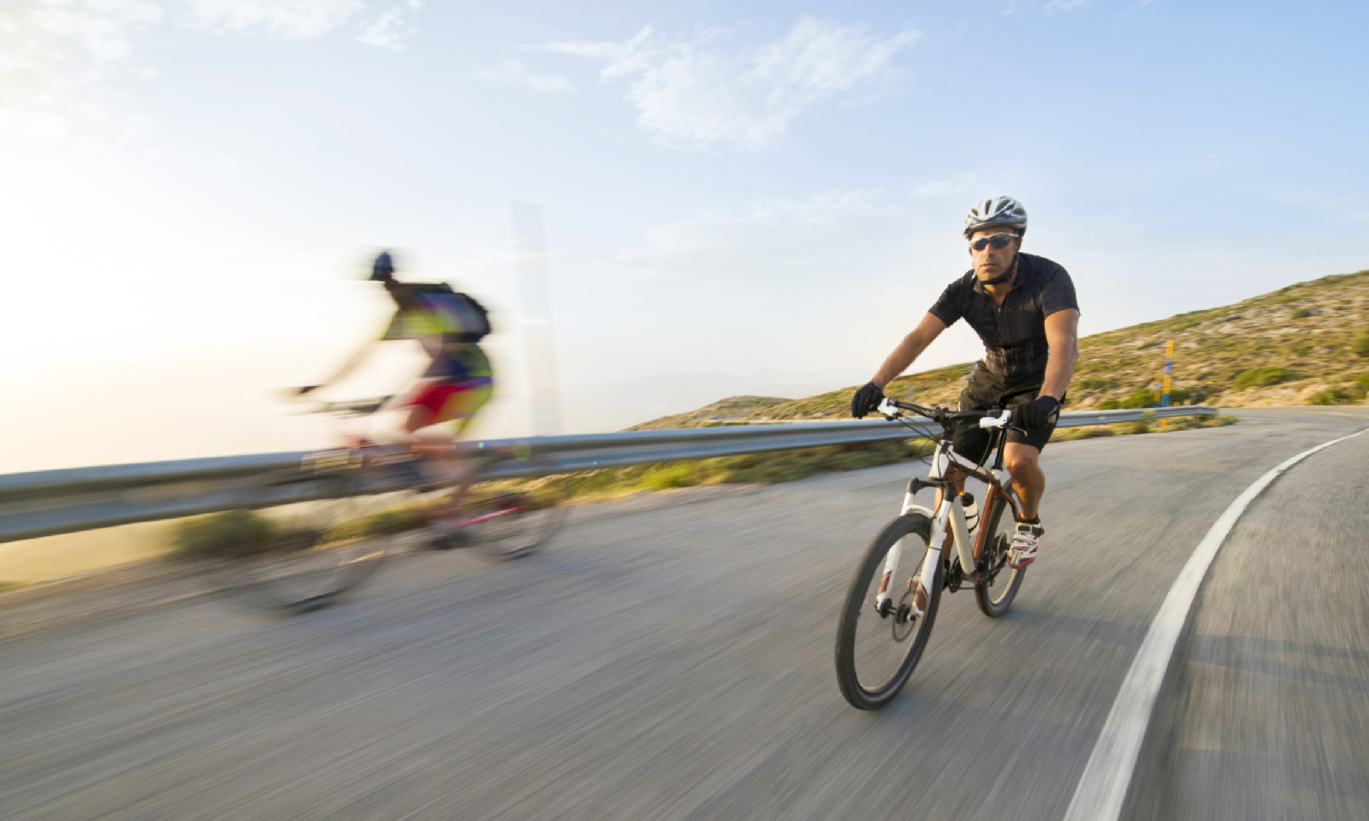 Fast cyclist on a mountain (Shutterstock)