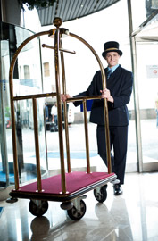 bellman bellhop hotel luggage cart