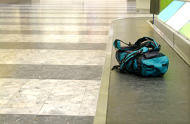 baggage carousel claim backpack airport checked