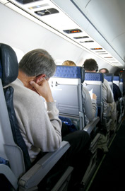 airplane sleep man travel