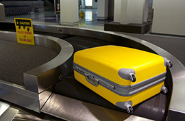 yellow suitcase baggage claim