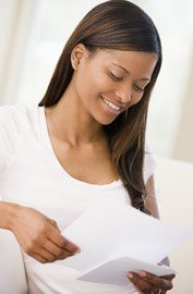 woman reading letter