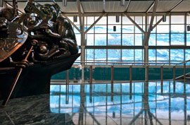 a statue inside the vancouver airport