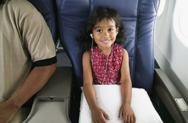 child on airplane