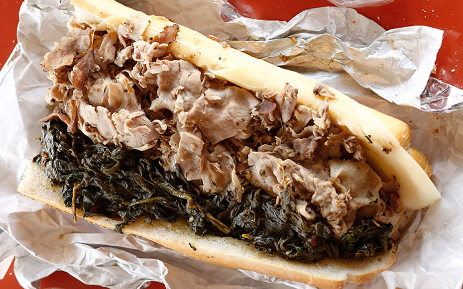 Cheesesteaks and hoagies may get all of the attention, but roast pork sandwiches are also big business in Philly. It’s the specialty of the house at John’s Roast Pork in South Philly, which often serves it topped with broccoli rabe. 
