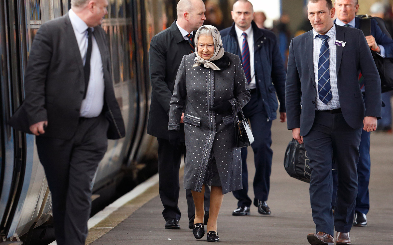 KING'S LYNN, UNITED KINGDOM - FEBRUARY 08: (EMBARGOED FOR PUBLICATION IN UK NEWSPAPERS UNTIL 48 HOURS AFTER CREATE DATE AND TIME) Queen Elizabeth II boards a train at King's Lynn Station to return to London after her Christmas break at Sandringham House o