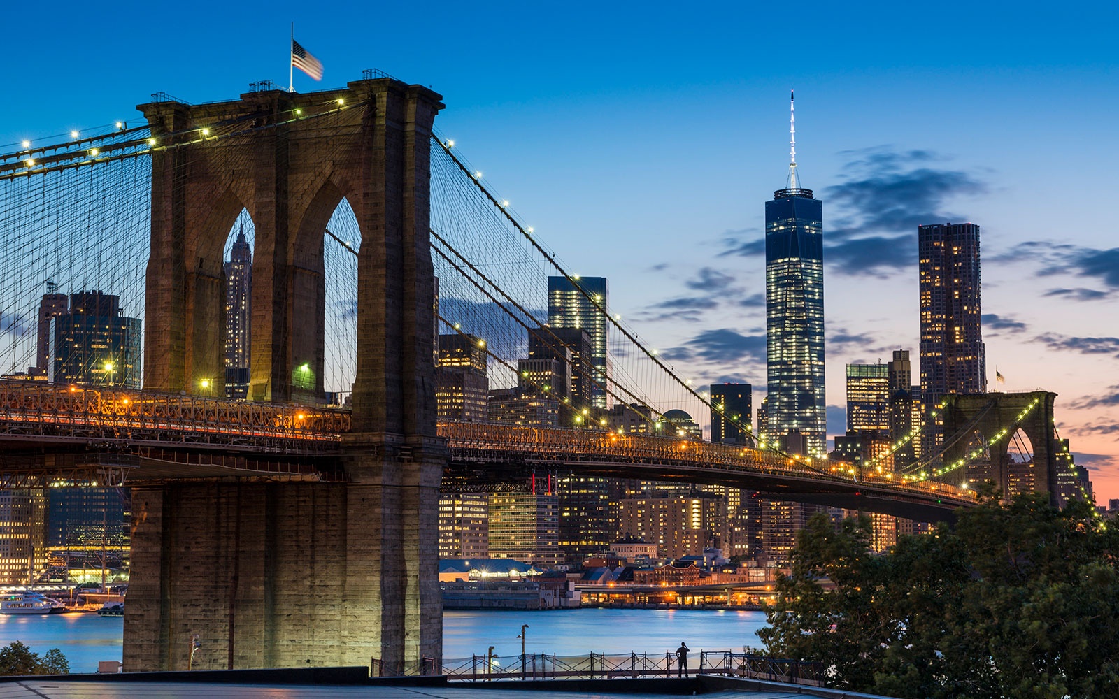 Tourist Scales the Brooklyn Bridge for Photo Op (and Doesn't Get Caught)