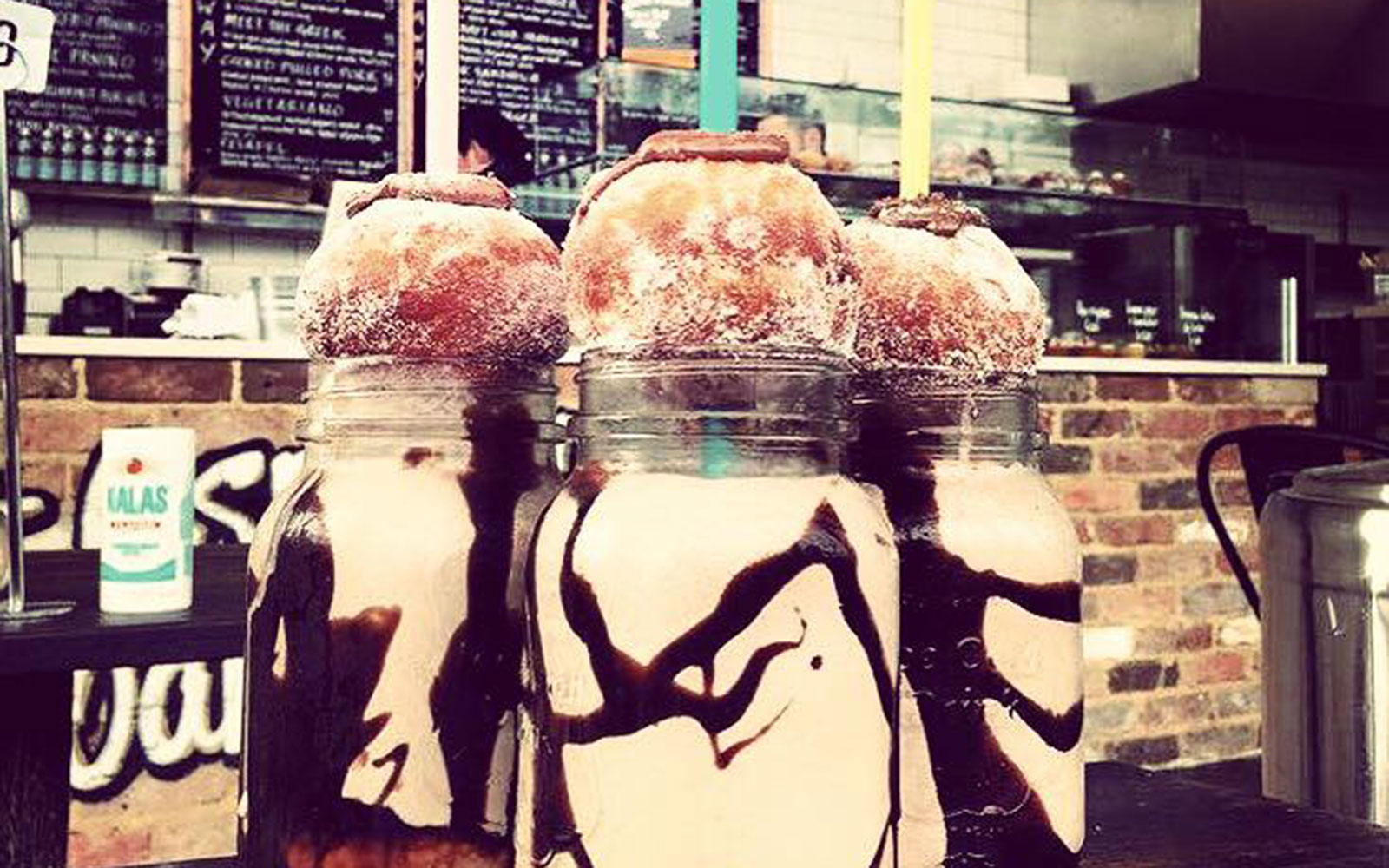 Behold, a Nutella Milkshake Topped with a Nutella-Filled Doughnut Ball