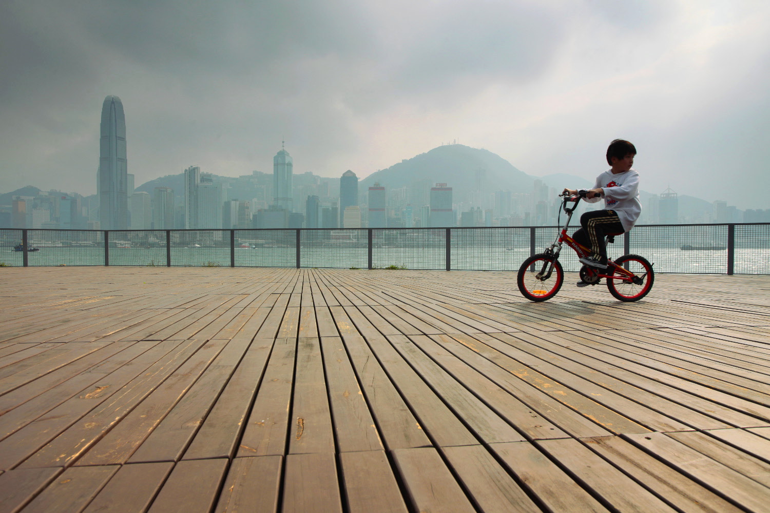 Cycling is a popular activity for families in Kowloon. Image by Ed Jones / Getty