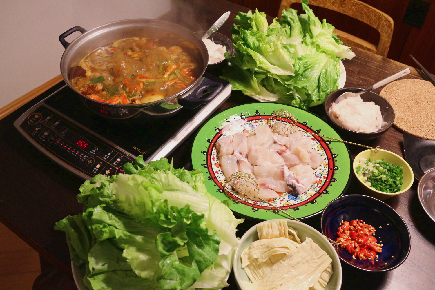 Spicy hotpot with all the condiments. Image by Piera Chen / londoninfopage