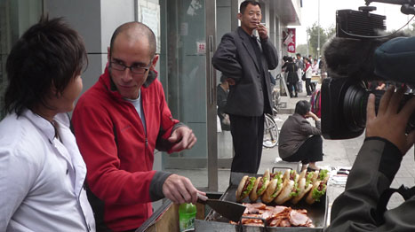 The author tries his hand at selling street food in Beijing